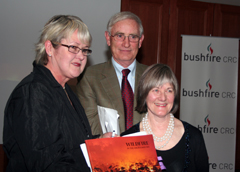Bushfire CRC Chairman Len Foster with Mansfield Shire Mayor Marg Attley (left) and Wildfire in the High Country editor Robin Purdey, at the Mansfield launch